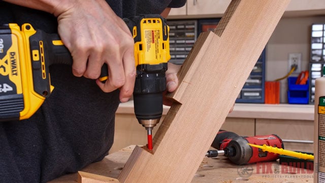 drilling hole in wooden piece