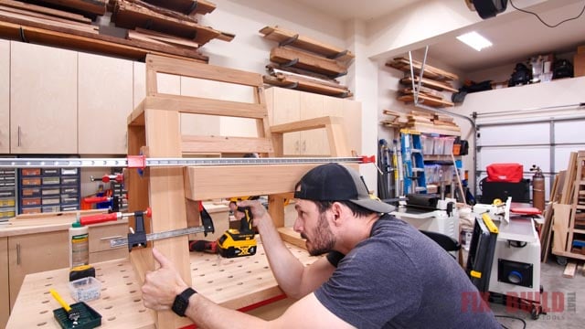 attaching wooden seat base to seat arms