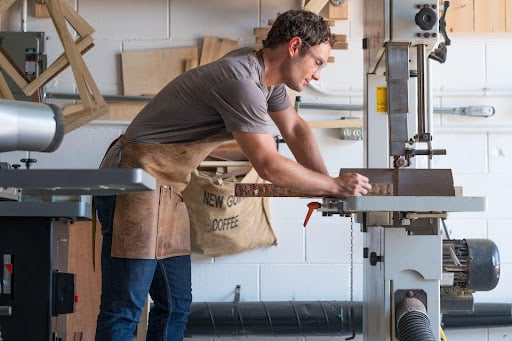 Woodworker working in a shop environment